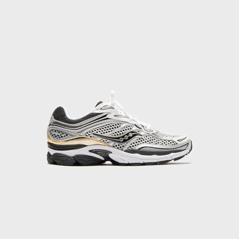 Saucony Progrid Omni 9 - Silver / Gold sold by Kith
