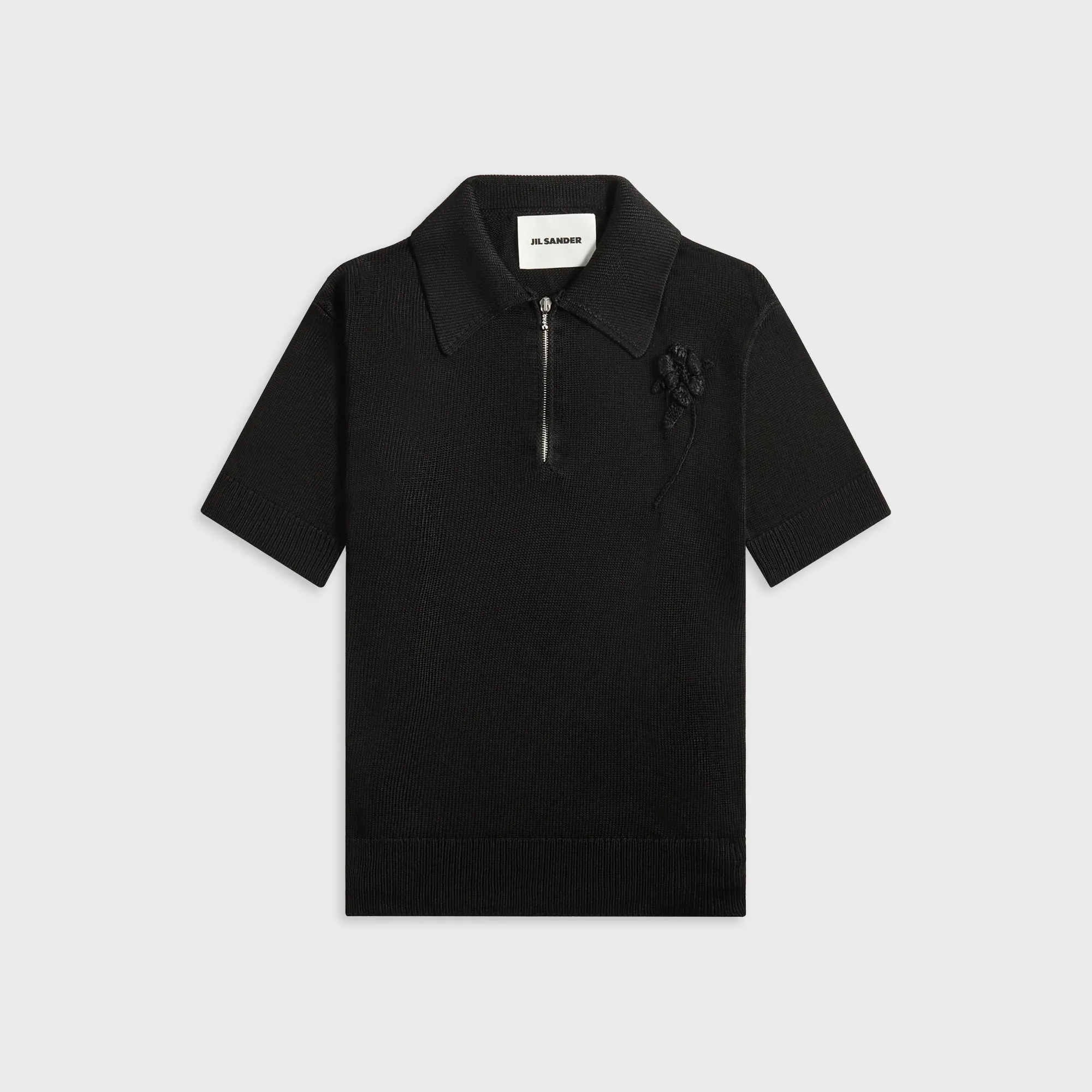 Jil Sander Knitted Polo Shirt With Crochet Flower - Black sold by Kith