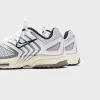 Nike WMNS Air Pegasus 2005 - White / Coconut Milk / Black / Metallic Silver sold by Kith