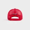 Kith for Cigarette Nolan Trucker Hat - Cinnabar sold by Kith