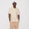 Kith Micro Waffle Drew Polo - Sandrift sold by Kith