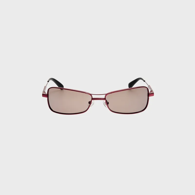Jacquemus Statzione Sunglasses - Bordeaux sold by Kith