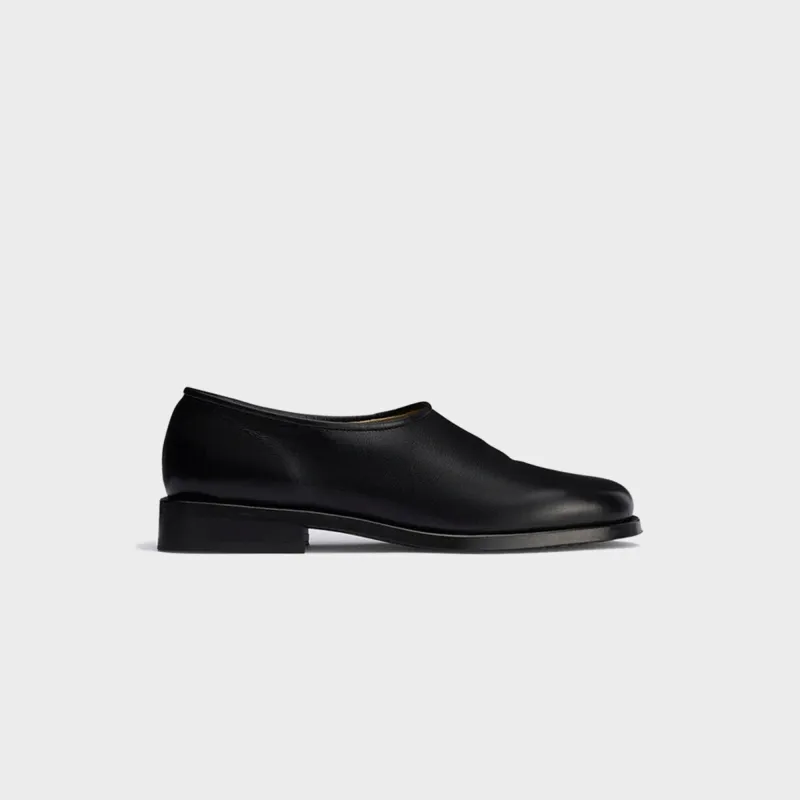 Lemaire Anatomic Slip On - Black sold by Kith