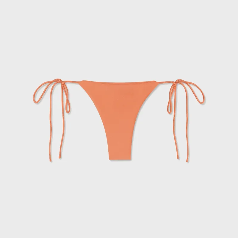 Asta Resort Mia String Bikini Bottom - Tangerine sold by Kith