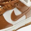 Nike WMNS Dunk Low LX - Phantom / Ale Brown / Sail / Metallic Gold sold by Kith