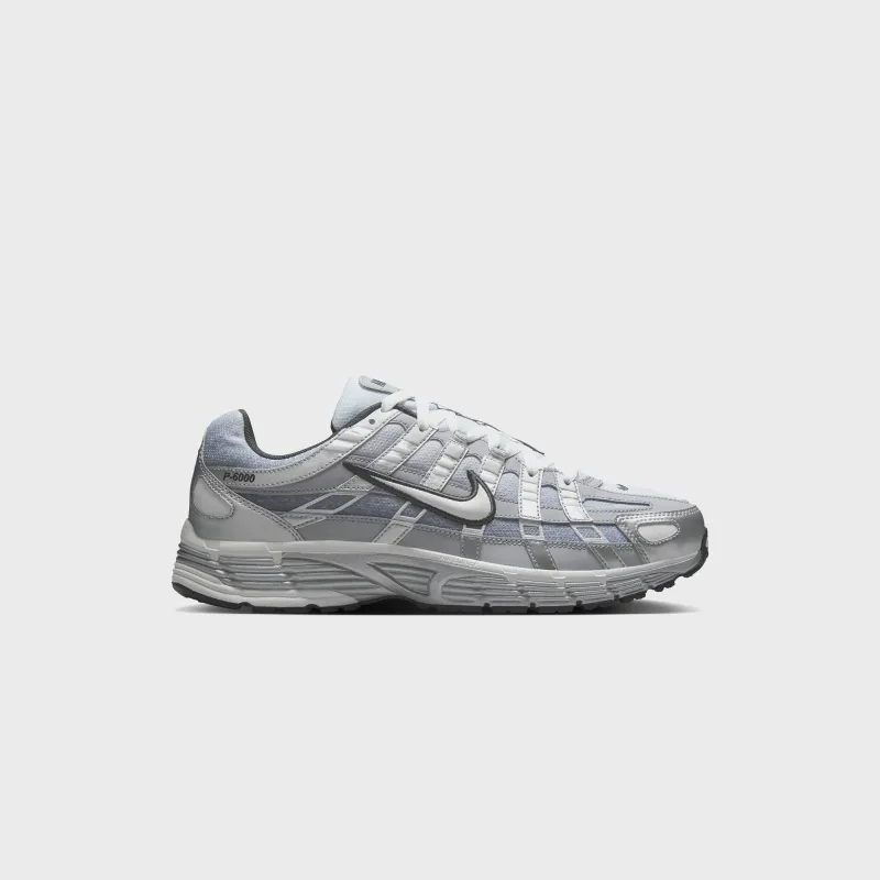 Nike P-6000 - Metallic Silver / Summit White / Wolf Grey sold by Kith