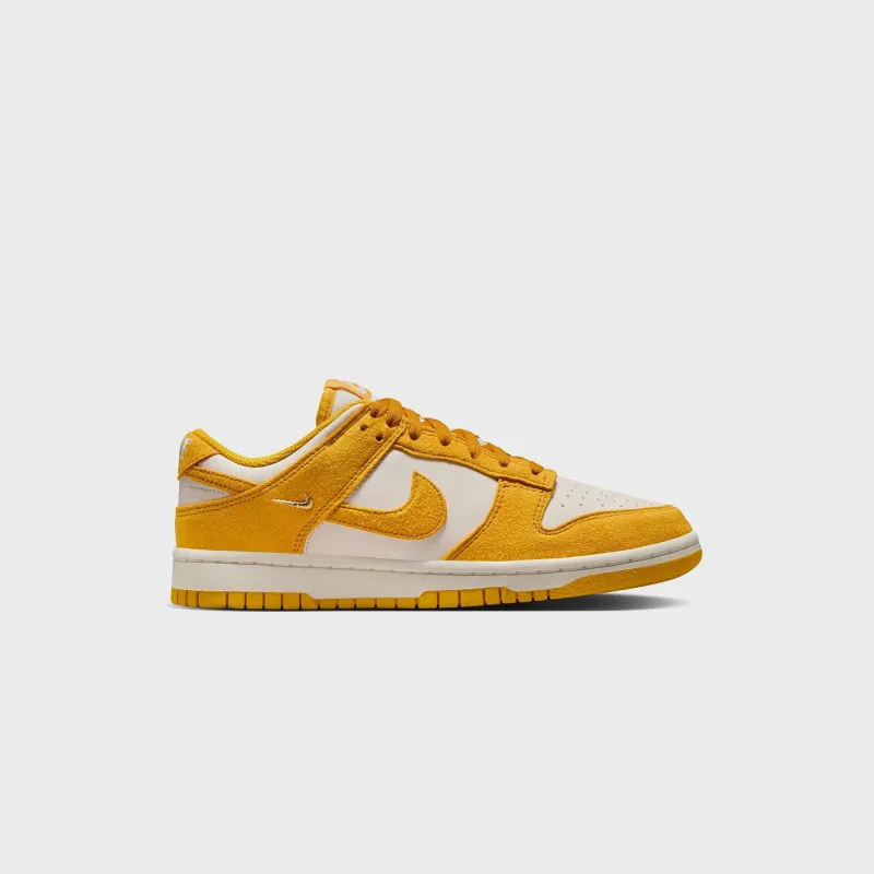 Nike WMNS Dunk Low - Pale Ivory / Dark Sulfur / Sail sold by Kith