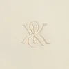 Kith Zip-Front Performance Knit Ethan Polo - Sandrift sold by Kith