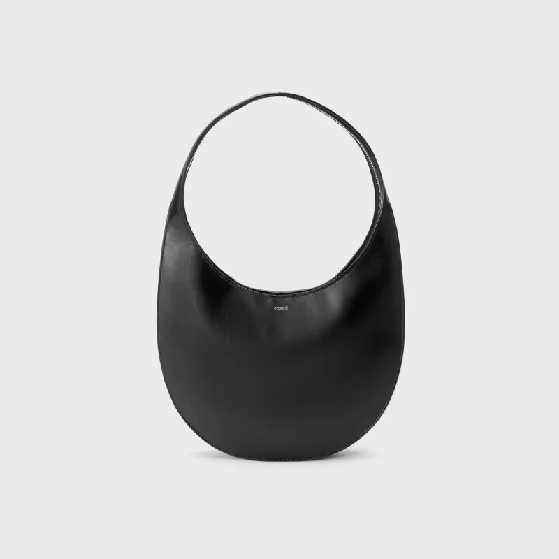 Coperni Medium Soft Swipe Bag - Black sold by Kith