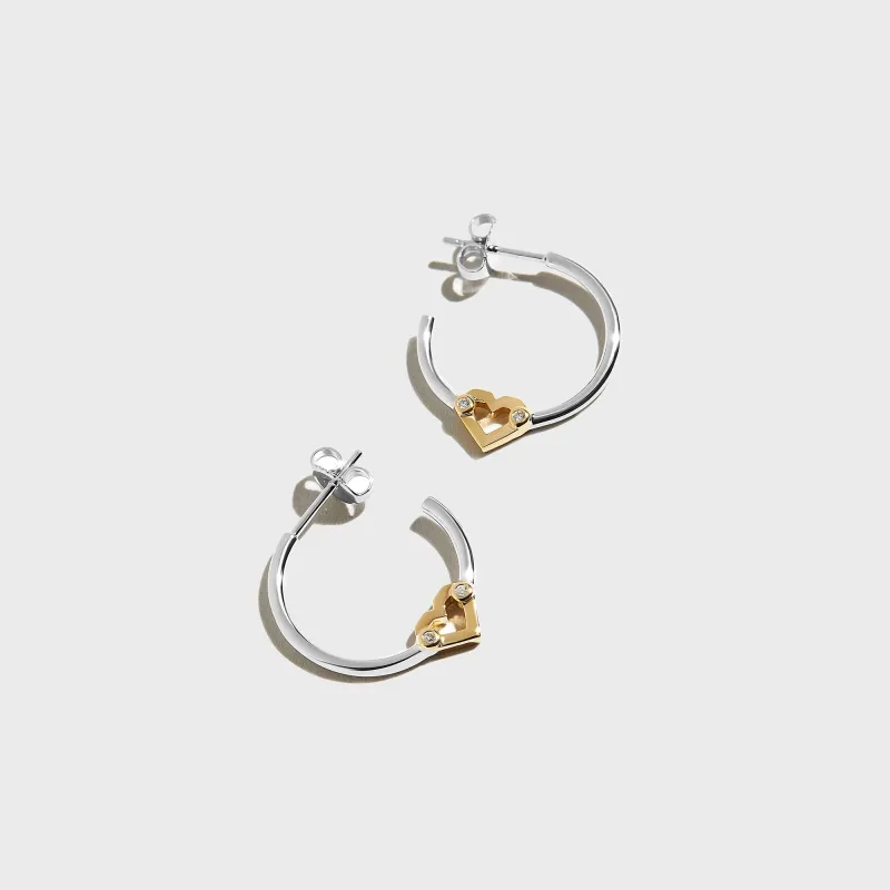 Greg Yuna Umlaut Heart Hoop Earrings - Silver / Gold sold by Kith
