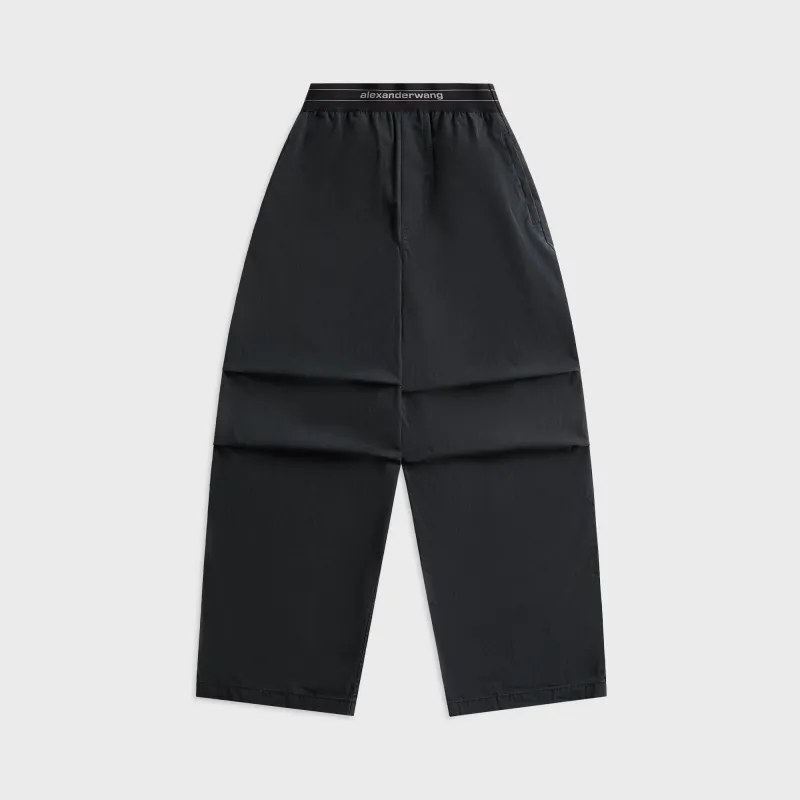 Alexander Wang Mid Rise Pleated Knee Pant with Elastic Logo - Black sold by Kith