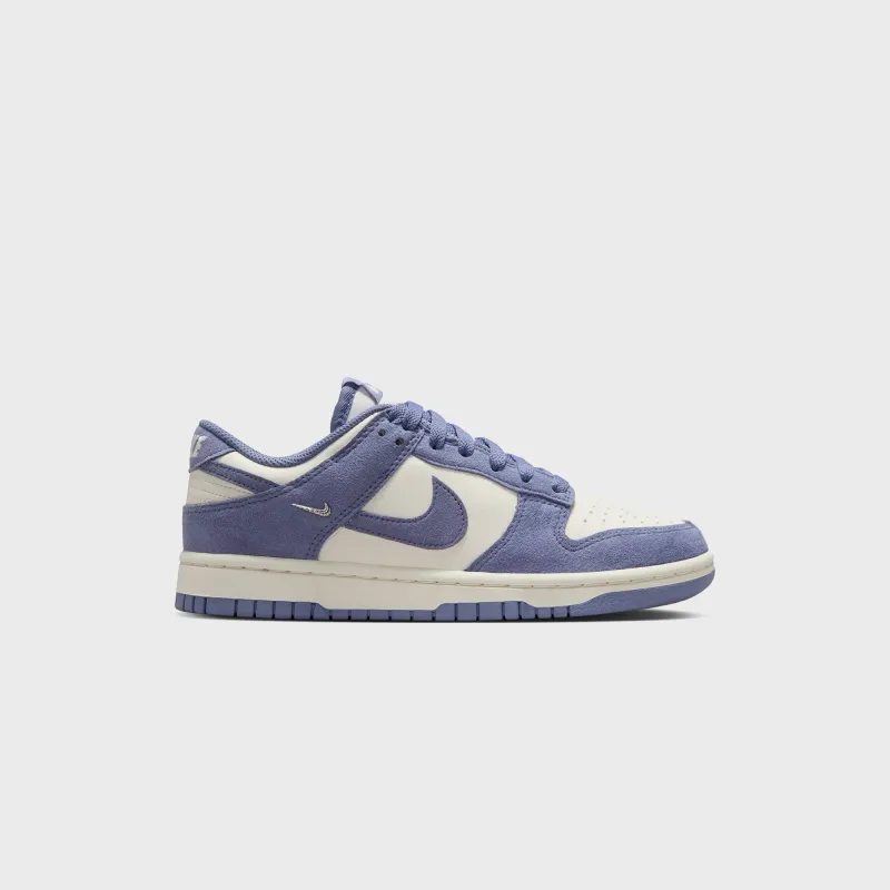 Nike WMNS Dunk Low - Sail / World Indigo / Metallic Silver sold by Kith
