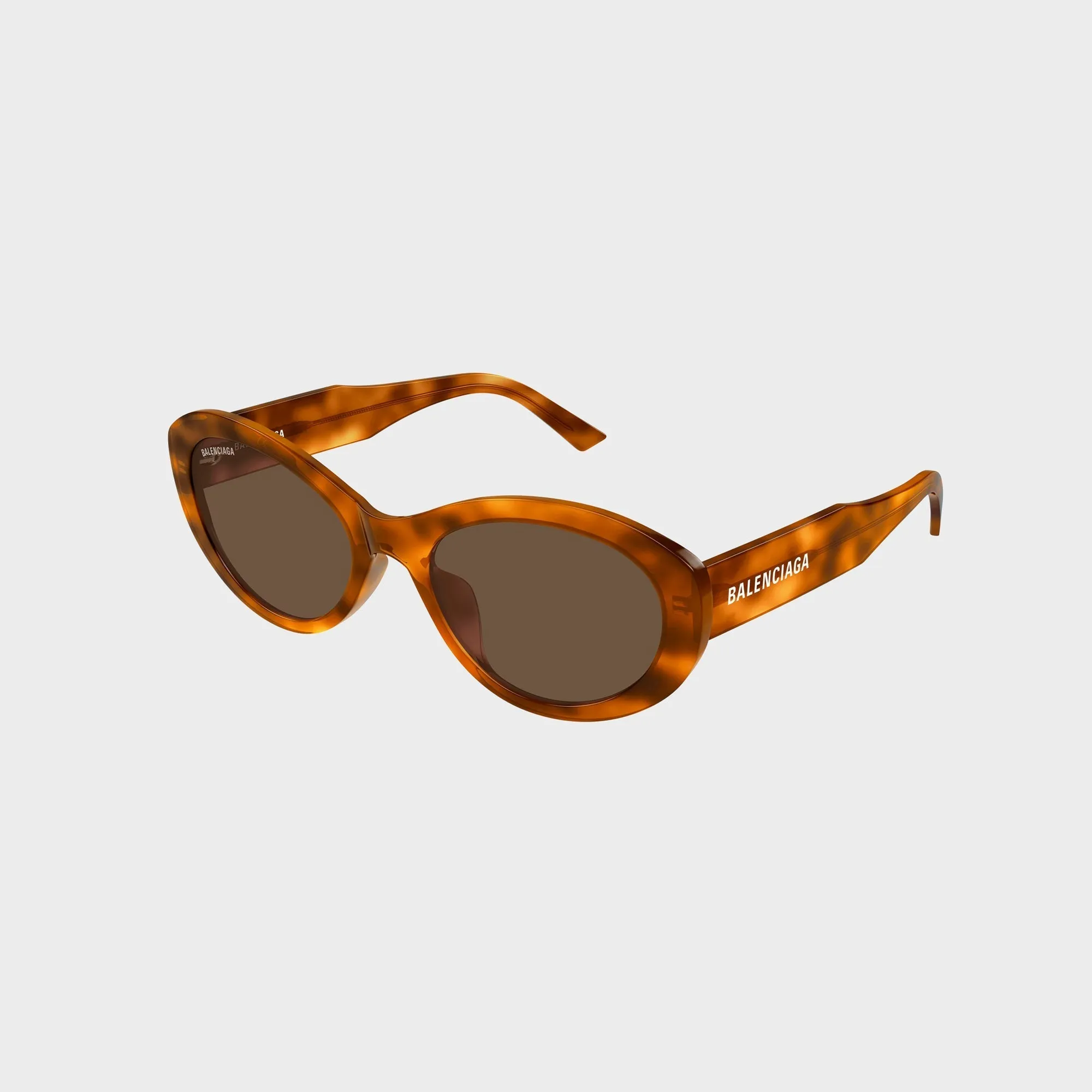 Balenciaga Flat Oval Sunglasses - Havana / Brown sold by Kith