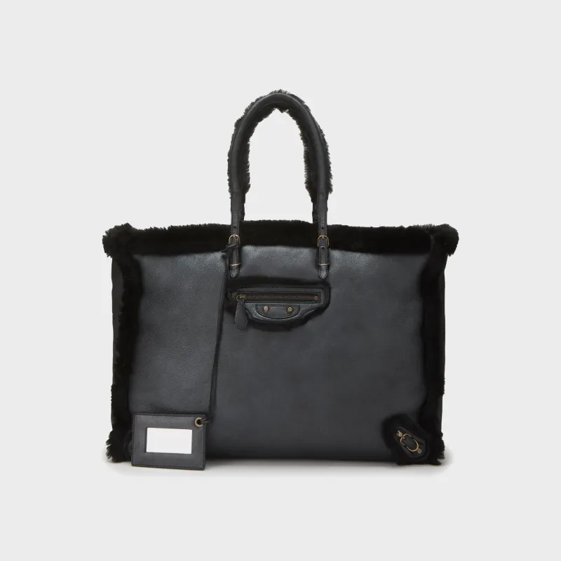 WGACA Balenciaga Shearling Papier A4 Large - Black sold by Kith