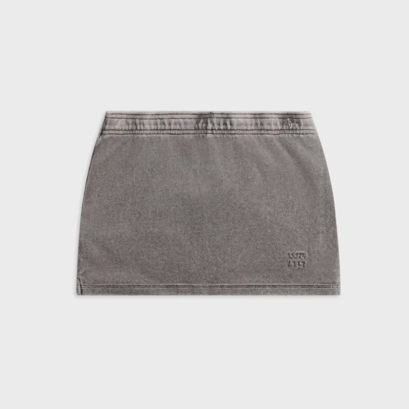 Alexander Wang Mid Rise Mini Skort With Embossed Logo - Washed Alloy sold by Kith