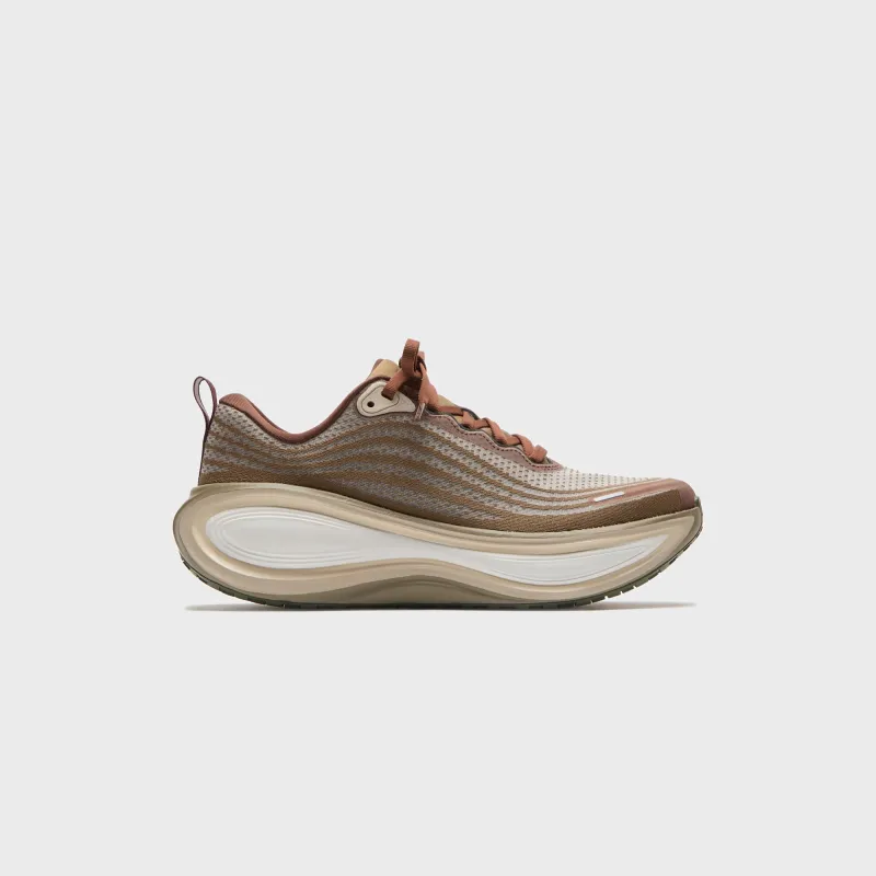 NIKE Vomero Plus - Off Noir / Pecan / Phantom / Natural sold by Kith