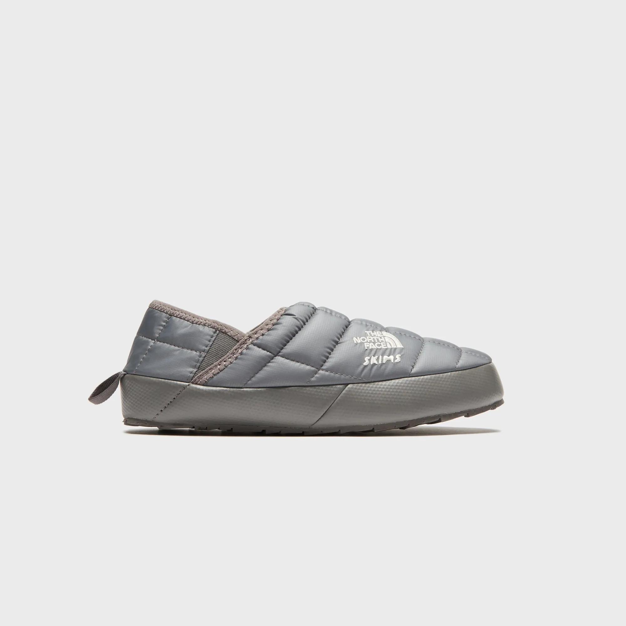The North Face x SKIMS WMNS Thermoball Traction Mule V - Gunmetal sold by Kith