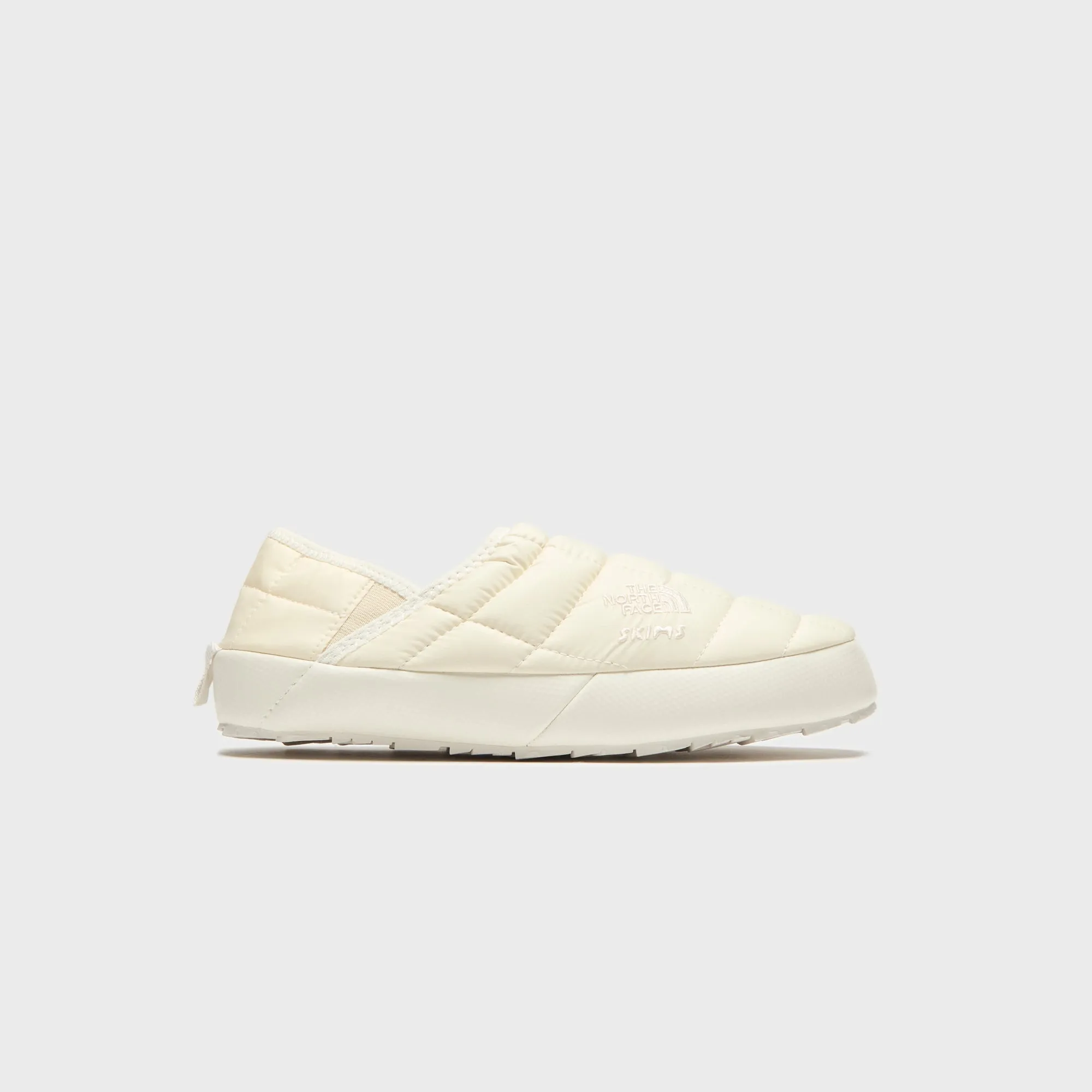 The North Face x SKIMS WMNS Thermoball Traction Mule V - Bone sold by Kith