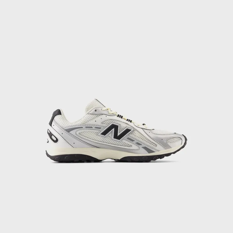 New Balance 204L - Silver Metallic / Black sold by Kith