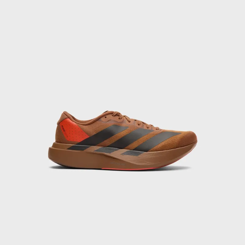 adidas x Pharrell Williams Adizero Evo SL - Brown / Craft Chili sold by Kith
