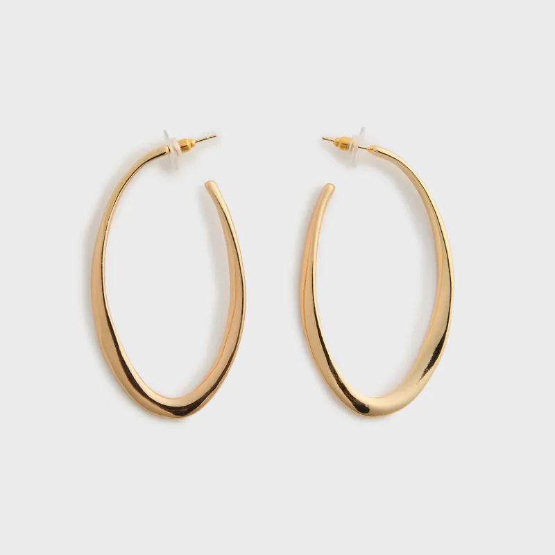 HONEY HALO Iza Sculpted Open Oval Hoop Earrings - Gold sold by Kith