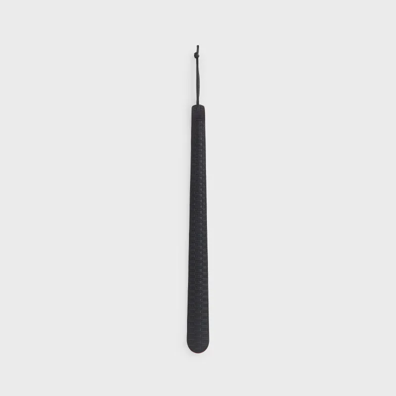 Kith Monogram Debossed Leather Shoe Horn - Black sold by Kith