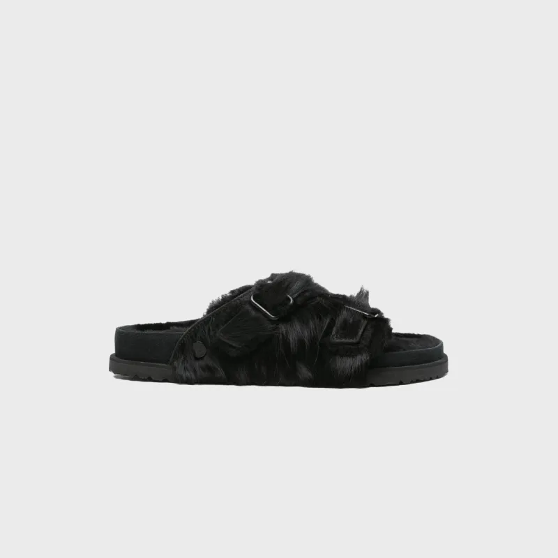 Birkenstock 1774 Zurich Pony Shearling - Black sold by Kith