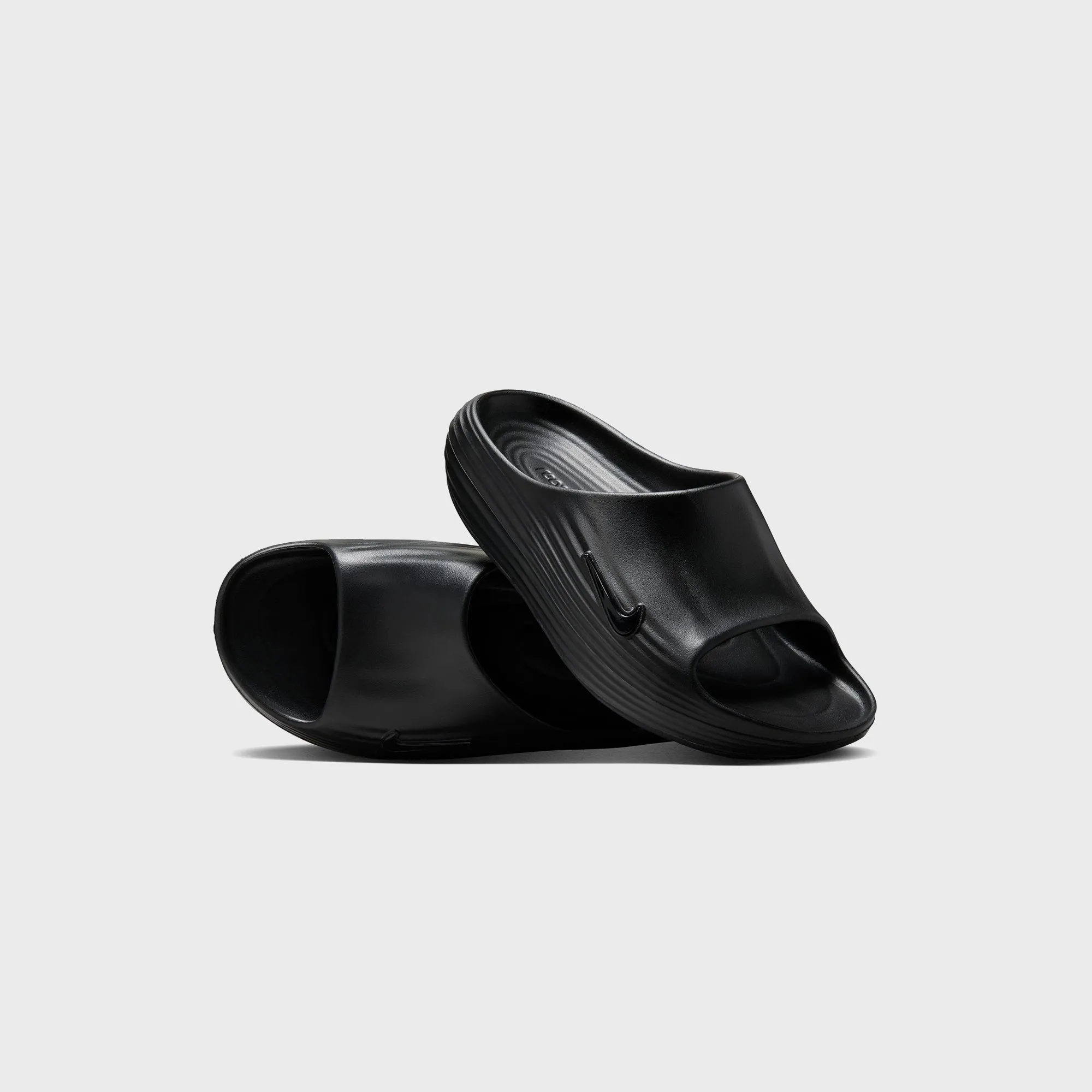 Nike Reactx Rejuven8 - Black / Black / Black sold by Kith product image thumbnail 2