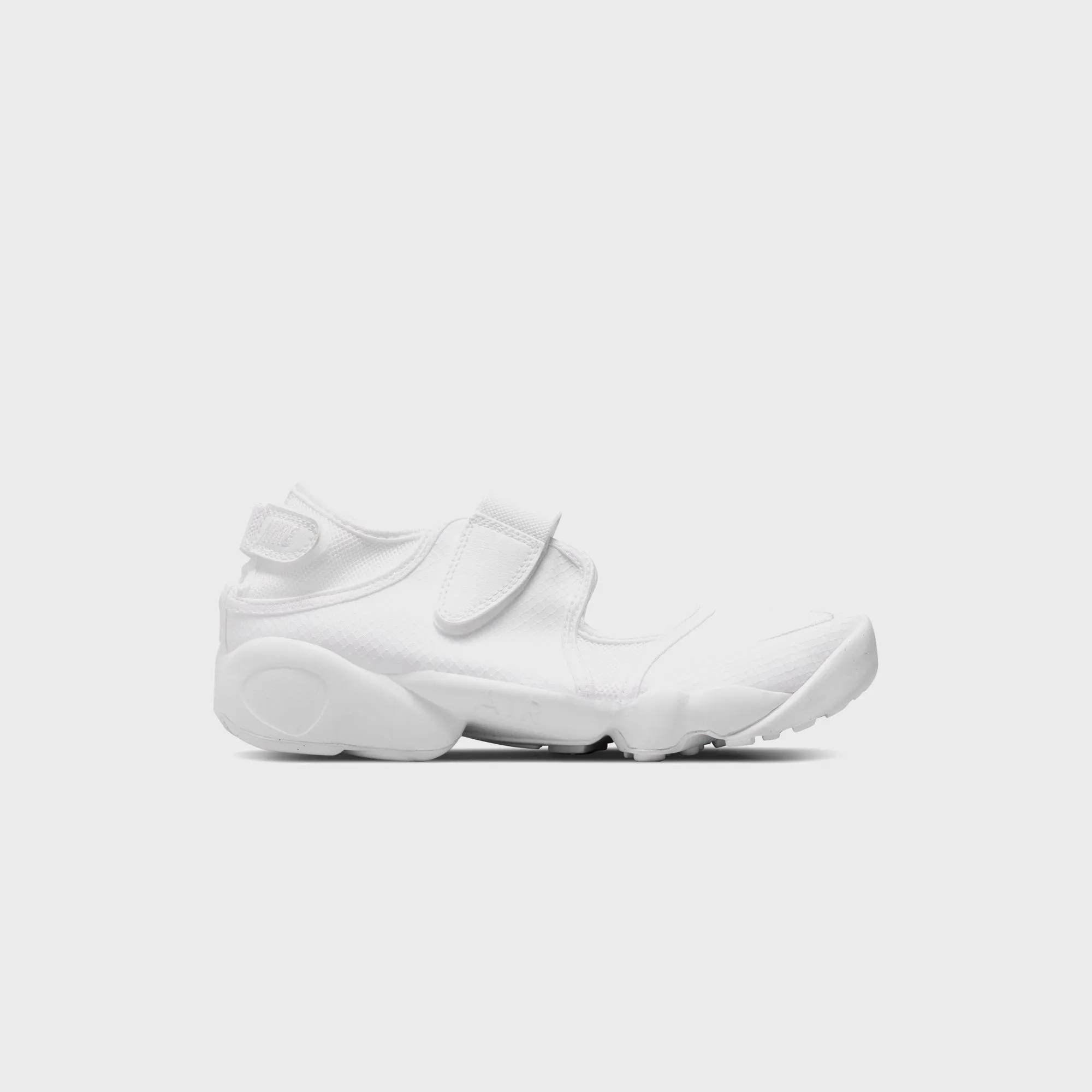 Nike WMNS Air Rift Breathe - White / Pure Platinum / White sold by Kith
