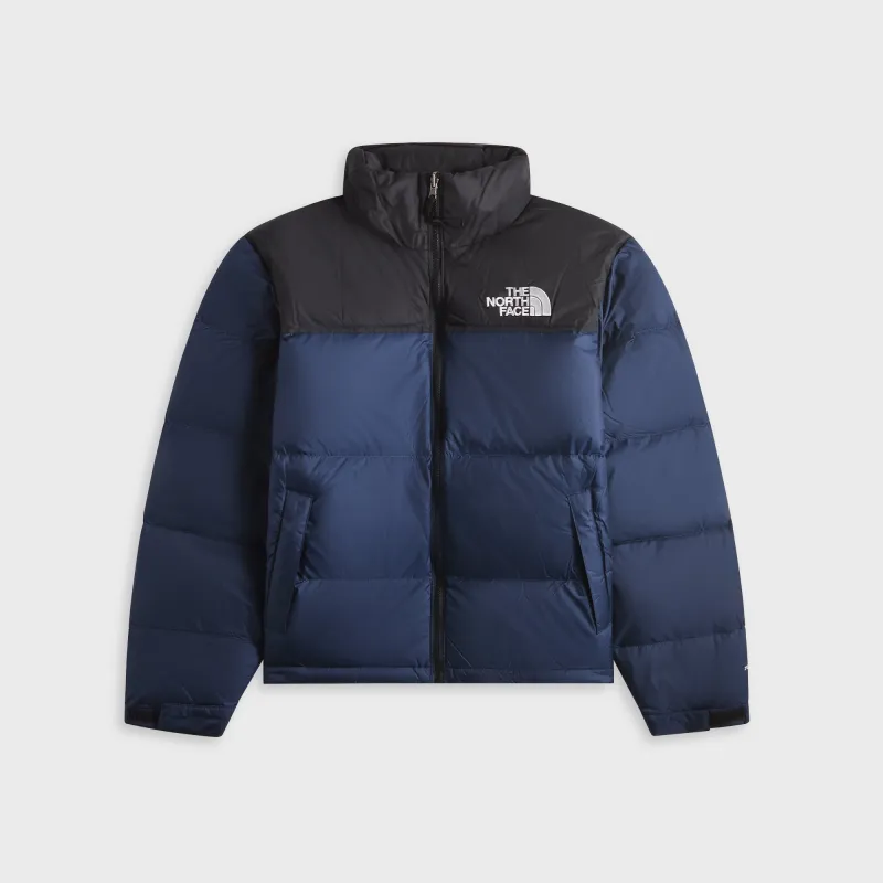 The North Face 1996 Retro Nuptse Jacket - Summit Navy / TNF Black sold by Kith