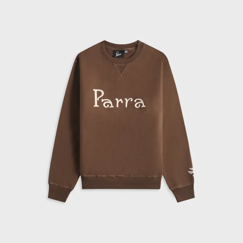 by Parra Weird Trad Logo Crew Neck Sweatshirt - Brown sold by Kith