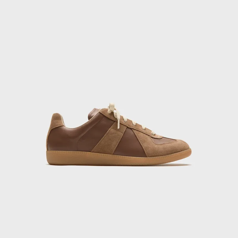Maison Margiela Replica Sneakers - Emperador sold by Kith