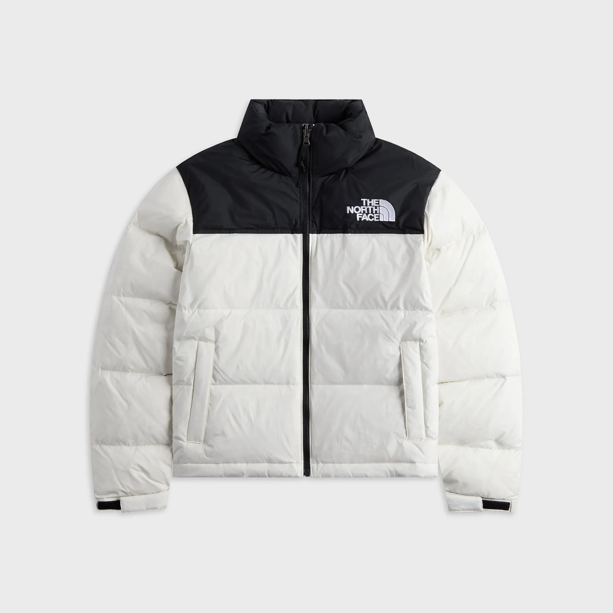 The North Face 1996 Retro Nuptse Jacket - White Dune / Black sold by Kith