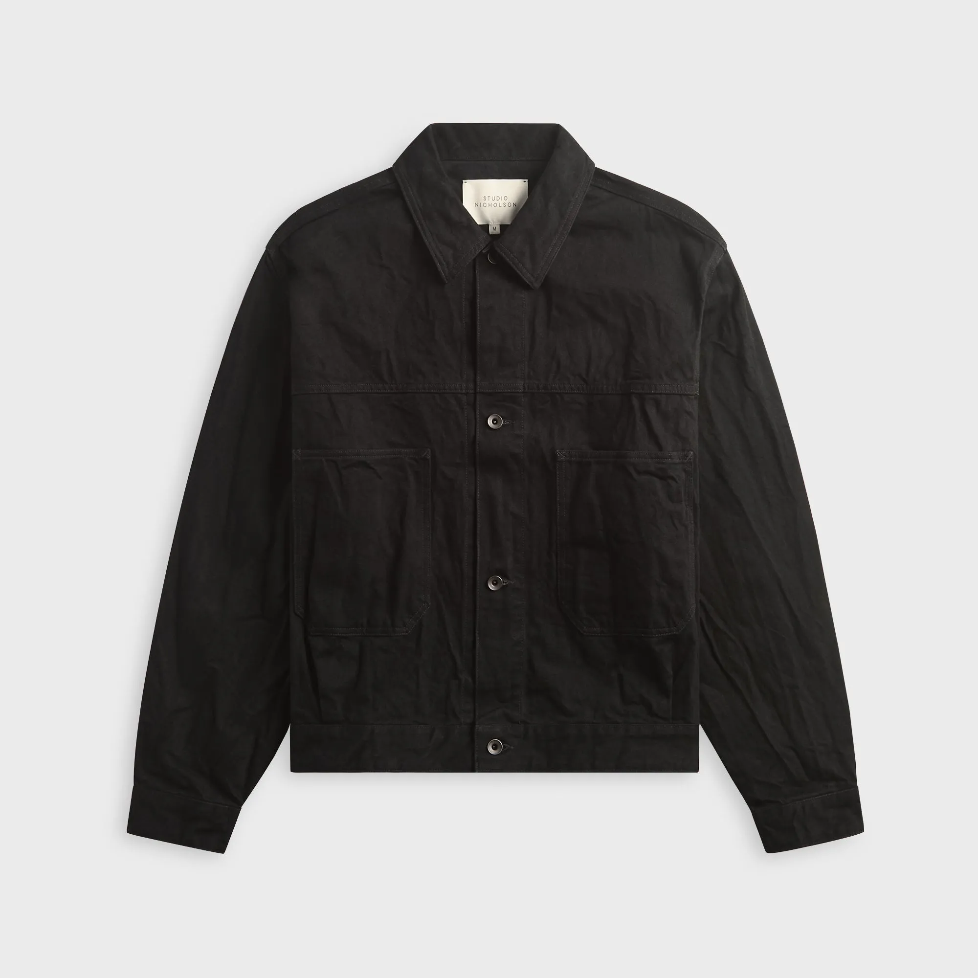 Studio Nicholson Nyle Crinkle Denim Jacket - Black sold by Kith