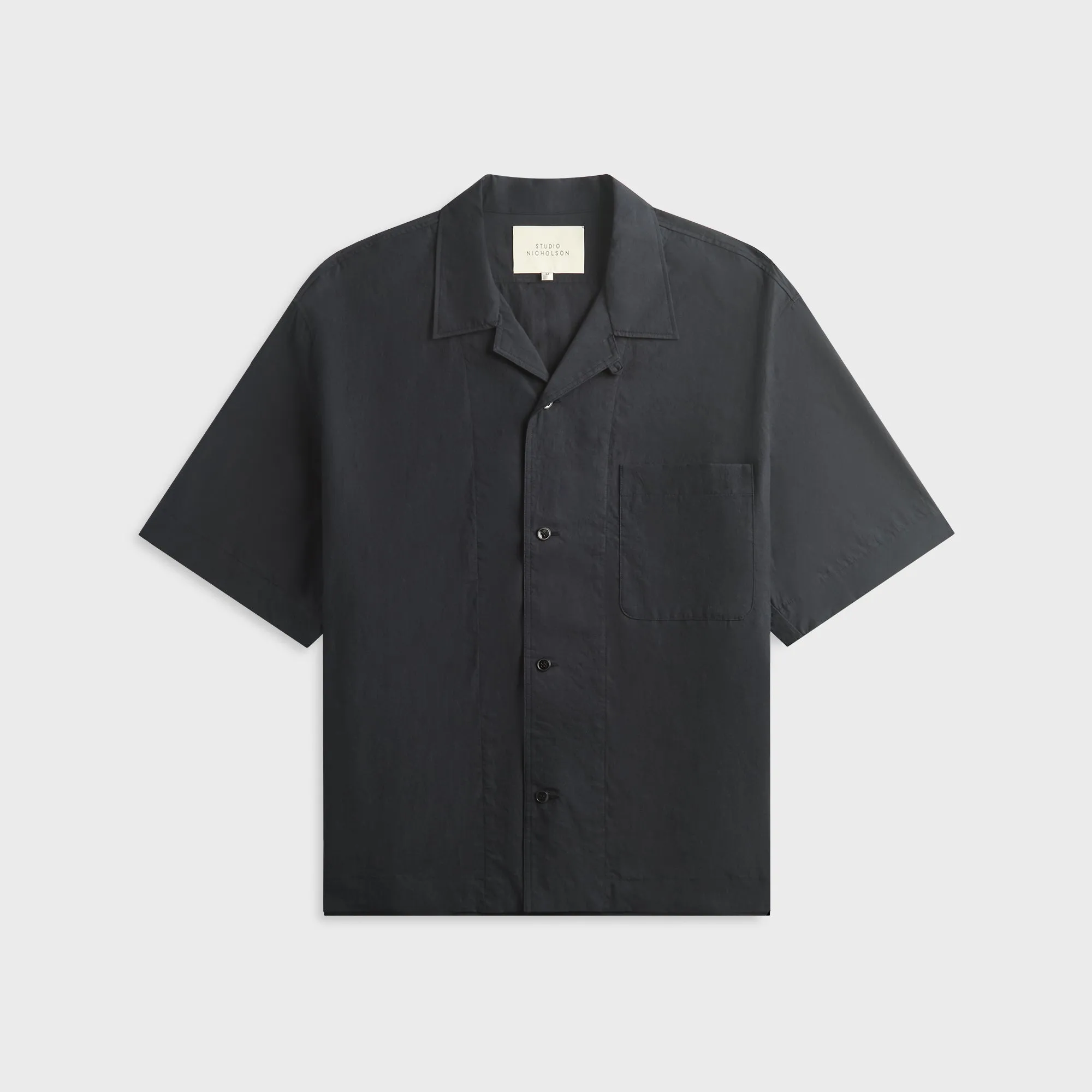 Studio Nicholson Agios Short Sleeve Shirt - Ink sold by Kith