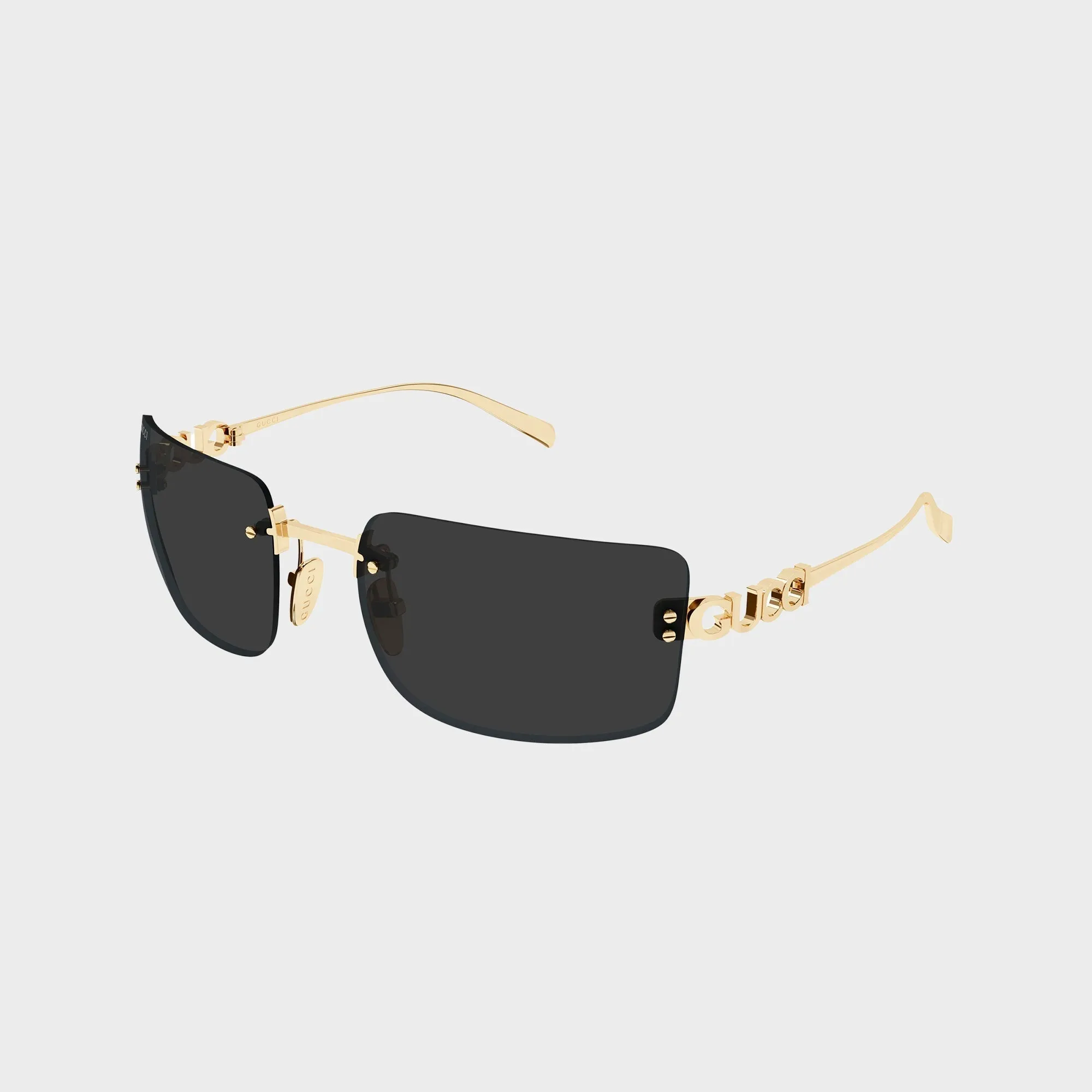 Gucci GG2038S Woman Rectangle Sunglasses - Gold / Grey sold by Kith