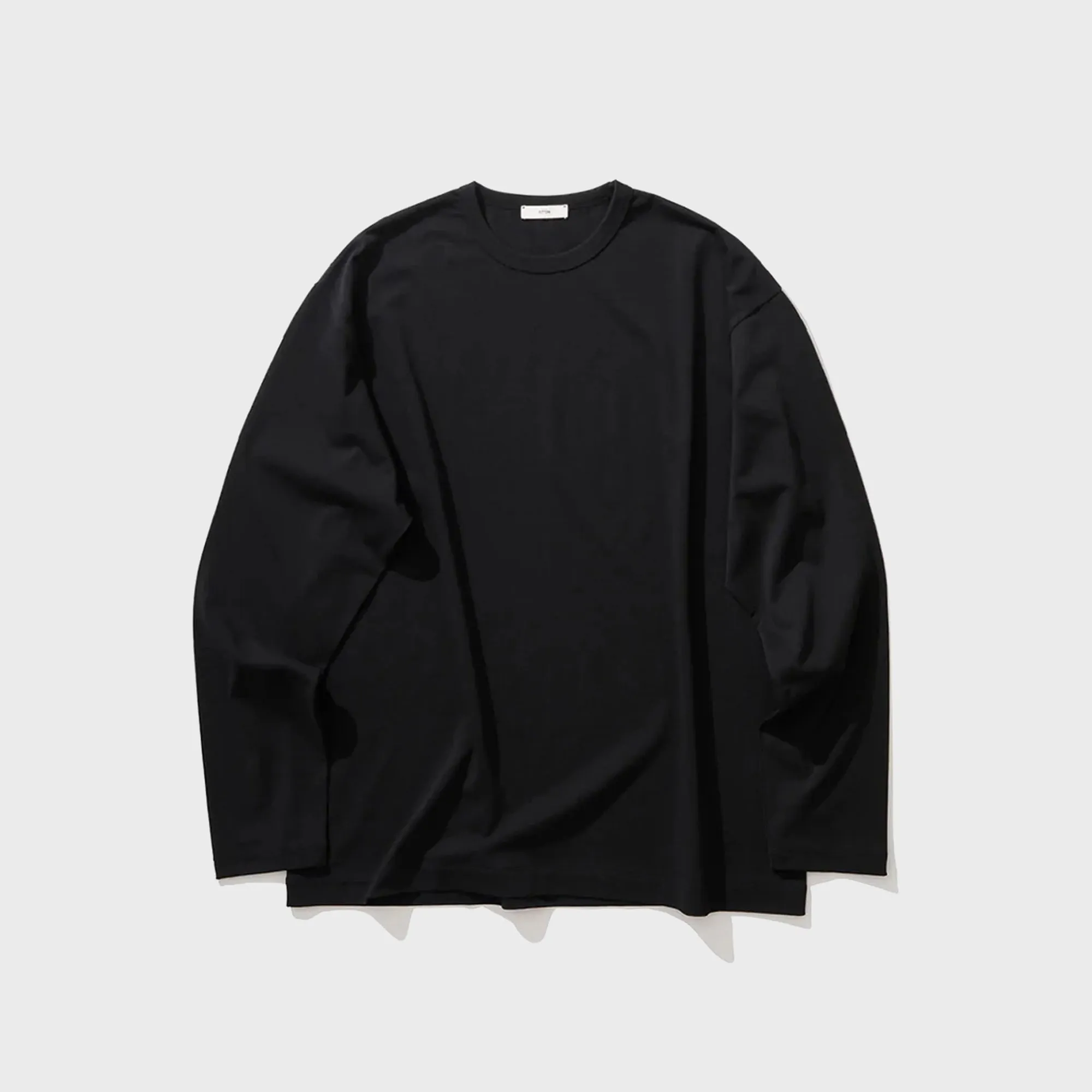 ATON Dry Cotton Jersey Standard Long Sleeve Tee - Black sold by Kith