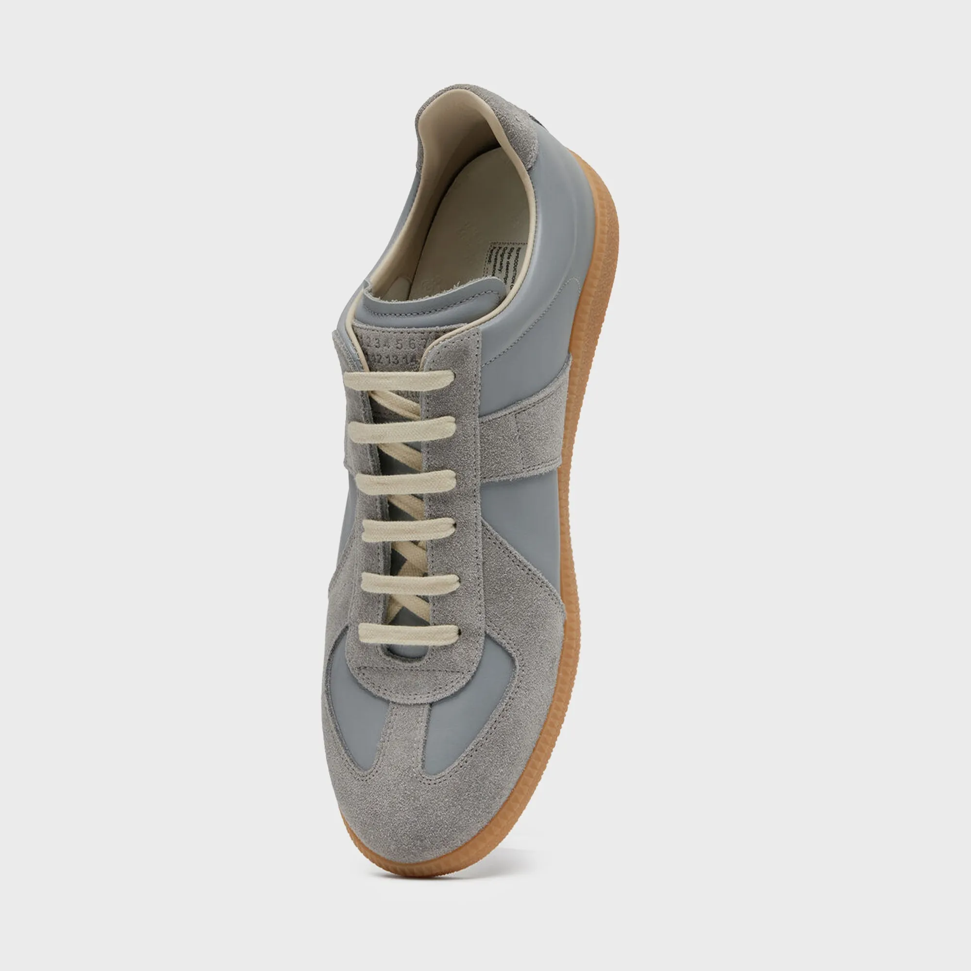 Maison Margiela Replica - Light Blue sold by Kith