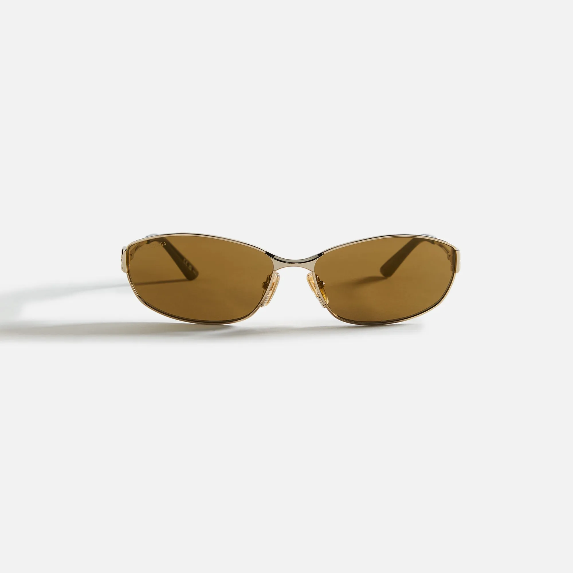 Balenciaga Metal 65 Frame - Gold sold by Kith