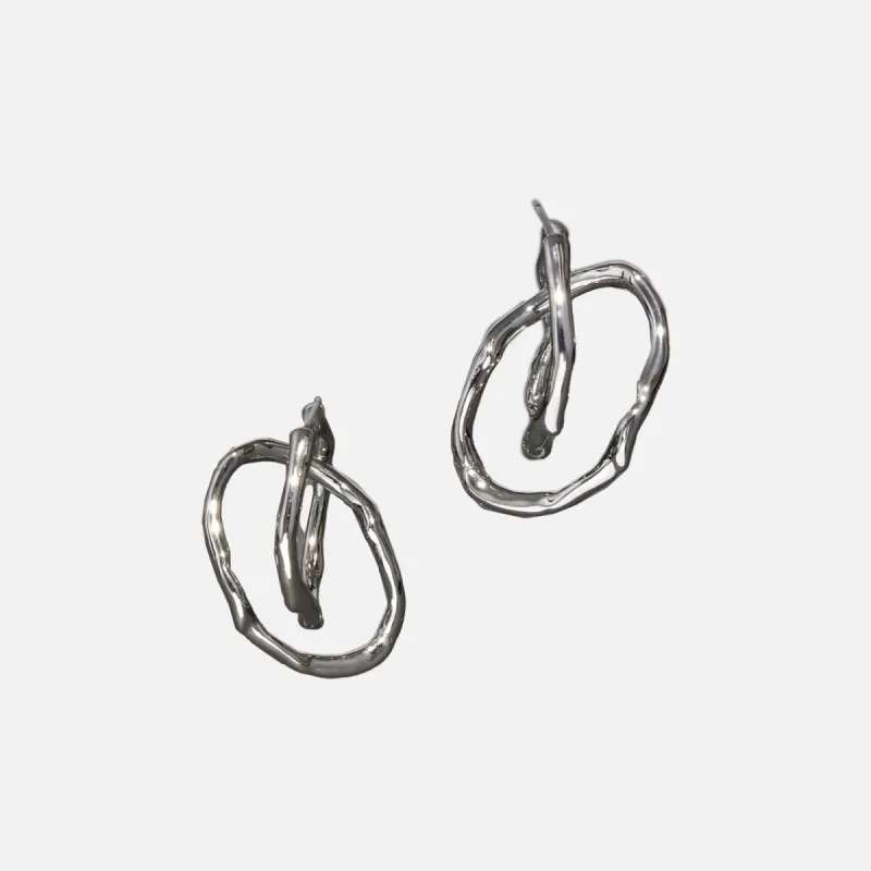 Alexis Bittar Twisted Interlock Hoop Earrings - Silver sold by Kith