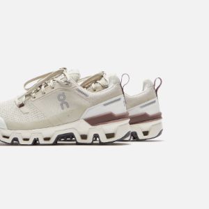 On Running WMNS Cloudwander Waterproof - Sand / Ivory sold by Kith
