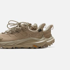 Hoka U Kaha 2 Low GTX - Oxford Tan / Dune sold by Kith