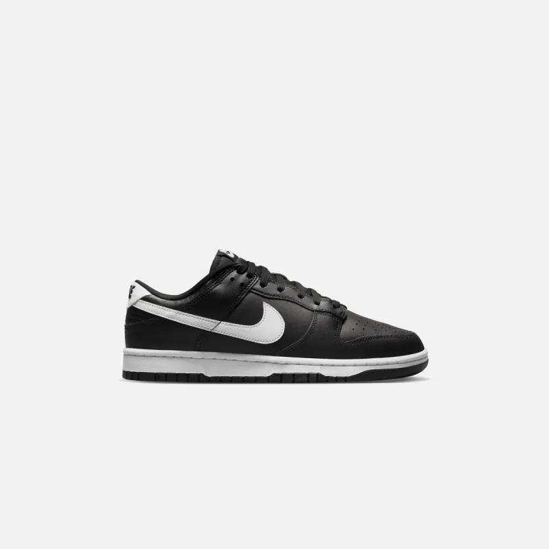 Nike Dunk Low Retro - Black / White sold by Kith