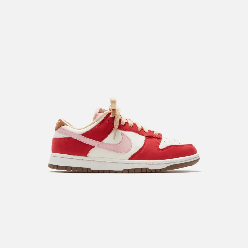 Nike WMNS Dunk Low Retro Premium - Sport Red / Sheen / Sail / Medium Brown sold by Kith