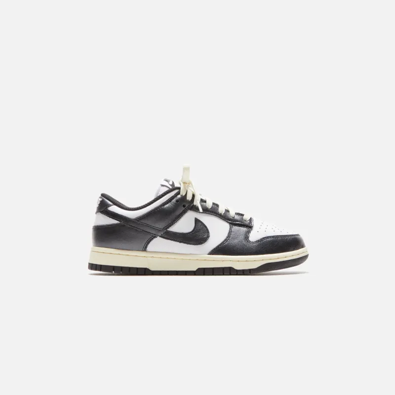 Nike WMNS Dunk Low - White / Black / Coconut Milk sold by Kith