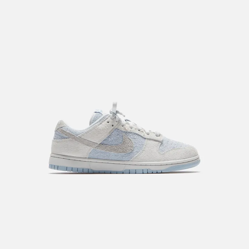 Nike WMNS Dunk Low - Photon Dust / Light Smoke Grey / Light Armory Blue sold by Kith
