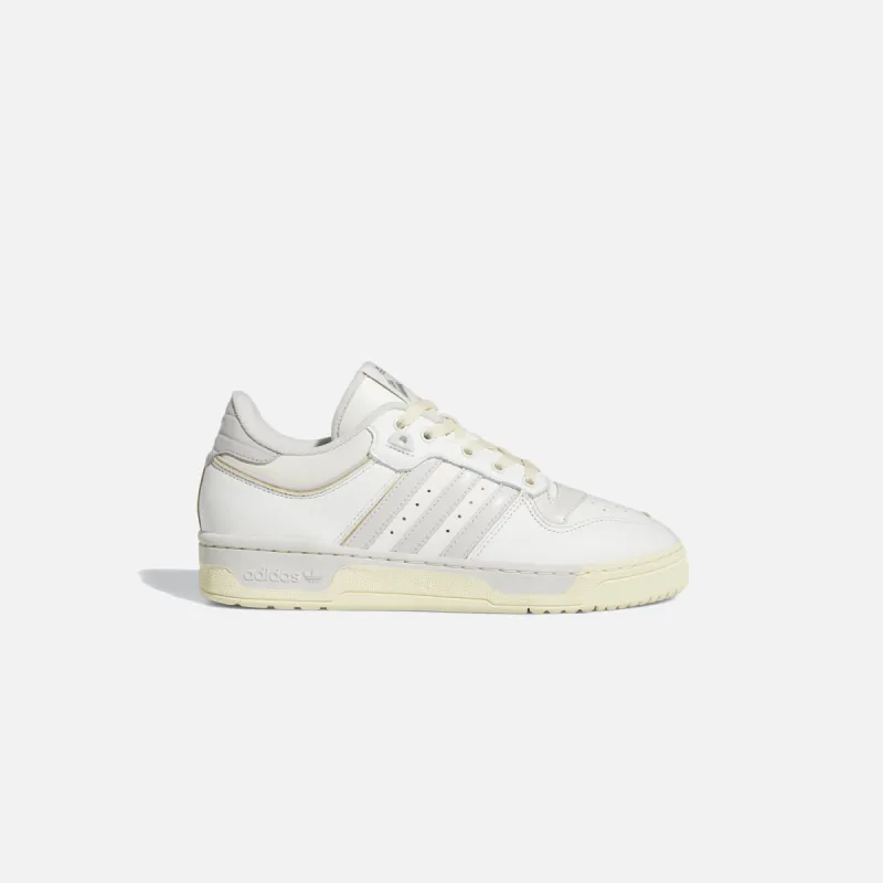 adidas Rivalry Low 86 - Footwear White / Grey Two / Off White sold by Kith