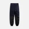 The North Face x Undercover Project 50/50 Down Pant - TNF Black / Aviator Navy sold by Kith