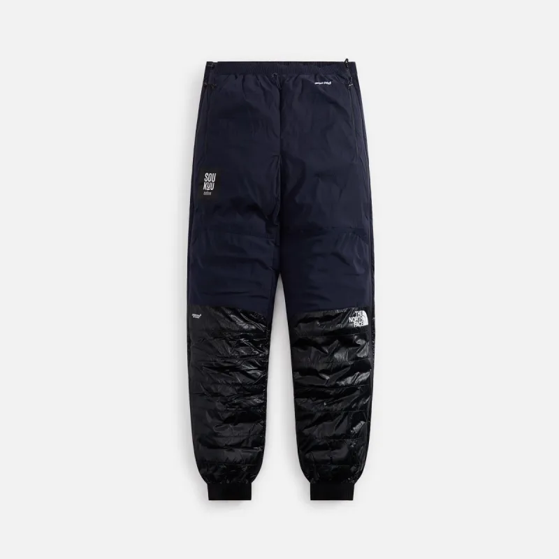 The North Face x Undercover Project 50/50 Down Pant - TNF Black / Aviator Navy sold by Kith