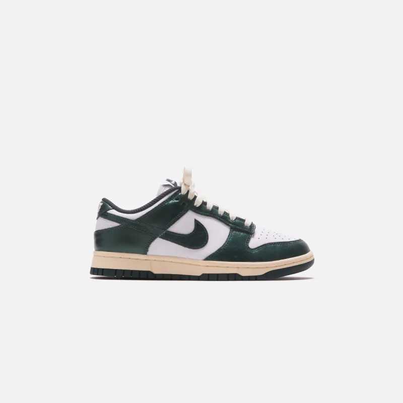 Nike WMNS Dunk Low - White / Pro Green / Coconut Milk sold by Kith